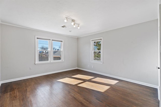 unfurnished room featuring ornamental molding and dark wood-type flooring