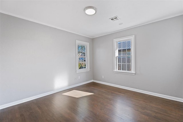 empty room featuring dark hardwood / wood-style floors