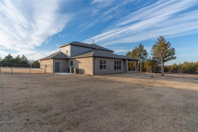 back of property with central air condition unit