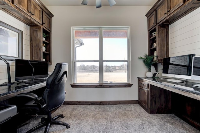 office area featuring ceiling fan and light colored carpet