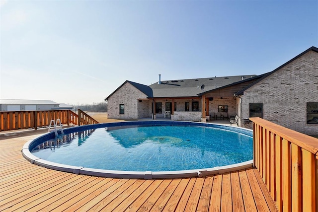 view of pool featuring a patio area