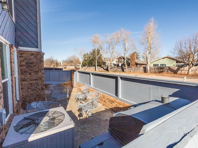 view of patio featuring central AC unit