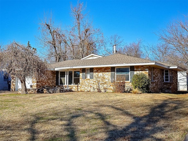 view of front of property with a front lawn