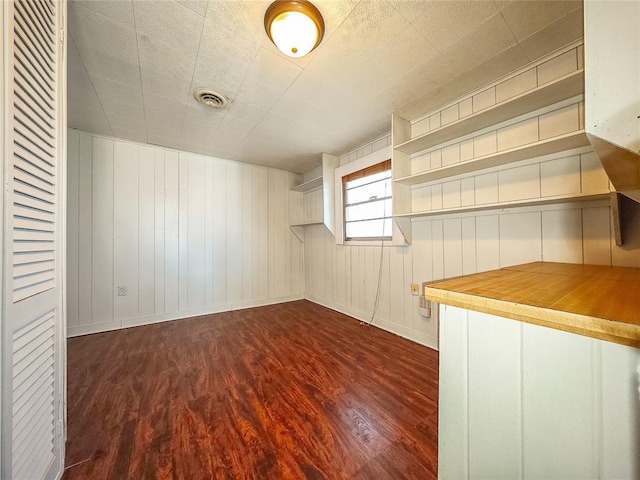 interior space featuring dark wood-type flooring