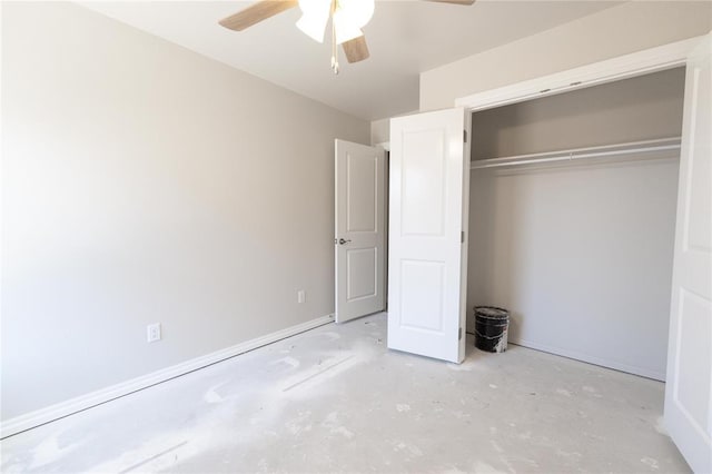 1917 Taines Turn, Norman, OK 73072 - unfurnished bedroom with a closet, baseboards, ceiling fan, and unfinished concrete floors