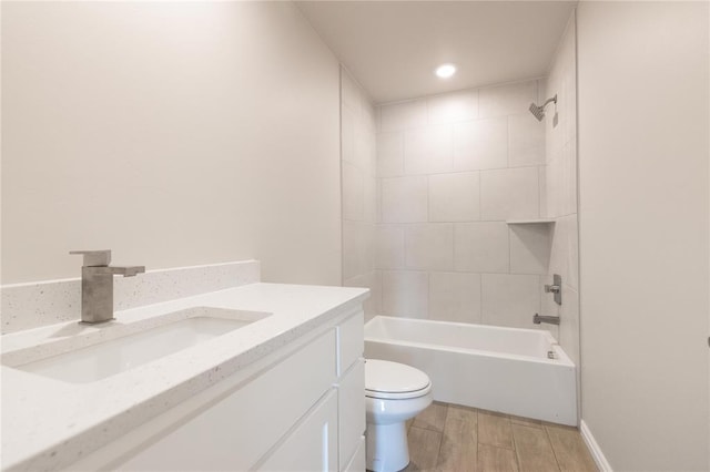 1917 Taines Turn, Norman, OK 73072 - bathroom featuring wood finish floors, vanity, shower / bathtub combination, toilet, and recessed lighting