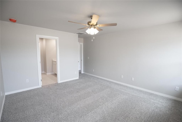 1917 Taines Turn, Norman, OK 73072 - unfurnished bedroom with carpet, a ceiling fan, and connected bathroom