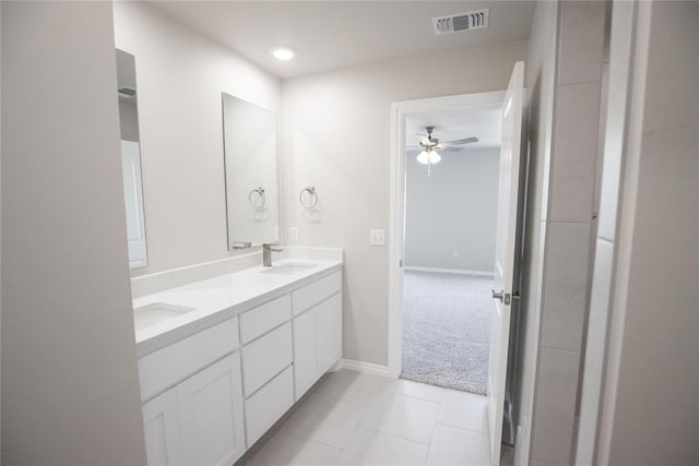 1917 Taines Turn, Norman, OK 73072 - bathroom with double vanity, ceiling fan, tile patterned floors, and recessed lighting