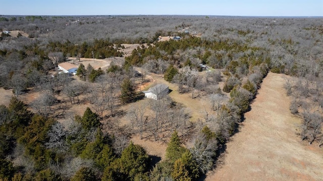 bird's eye view featuring a view of trees