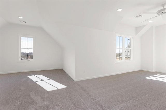 bonus room featuring carpet flooring, ceiling fan, and lofted ceiling