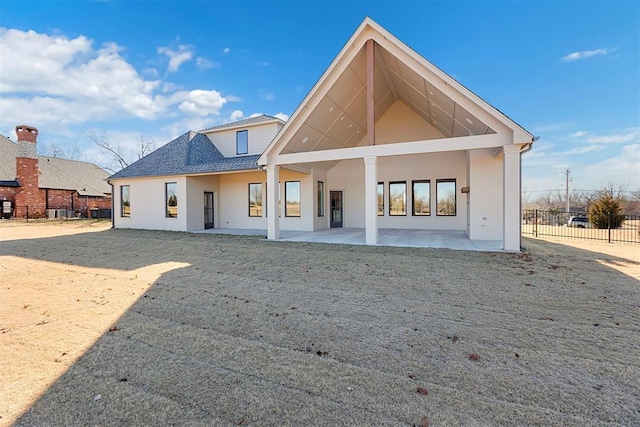 rear view of house with a patio area