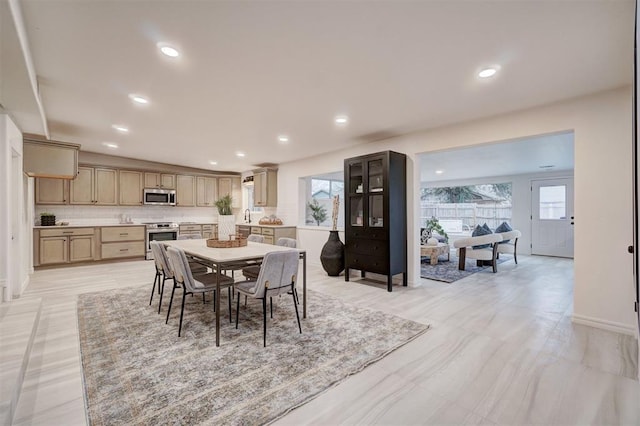 dining space with sink