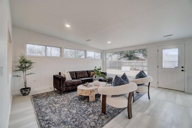 living room with vaulted ceiling