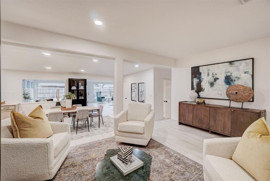 living room with light hardwood / wood-style floors