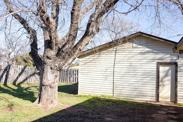 view of home's exterior featuring a yard