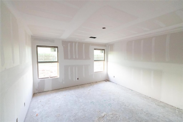 spare room with a healthy amount of sunlight