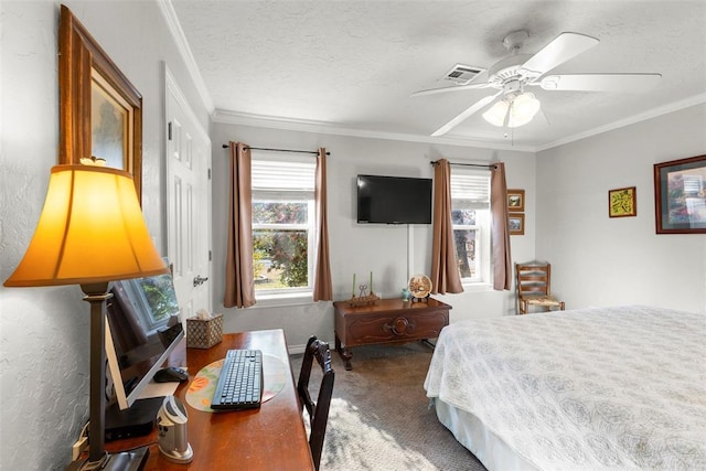 bedroom featuring carpet, a textured ceiling, ceiling fan, and crown molding