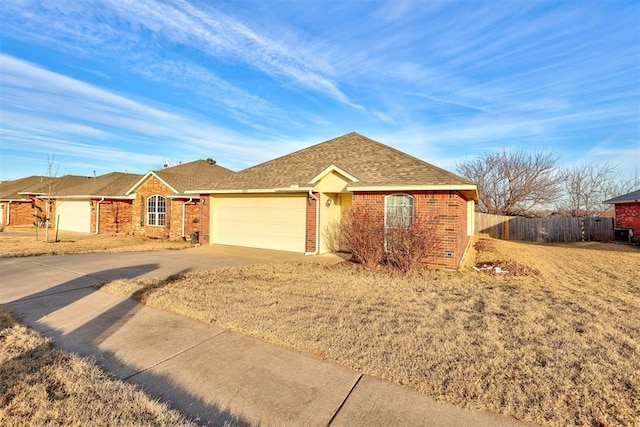 single story home with a garage