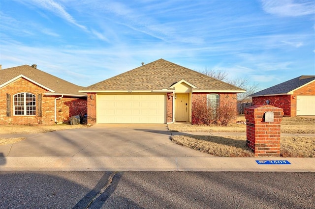 single story home with a garage