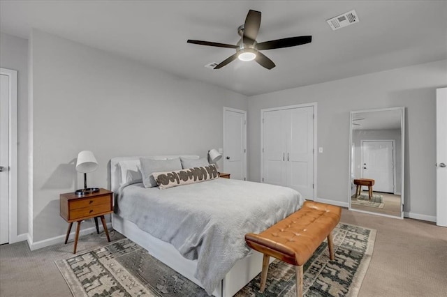 bedroom with light carpet, baseboards, visible vents, and a ceiling fan