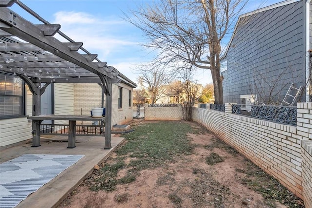 view of yard featuring a patio and a pergola