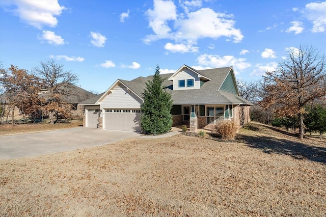 craftsman-style house featuring a porch and a garage