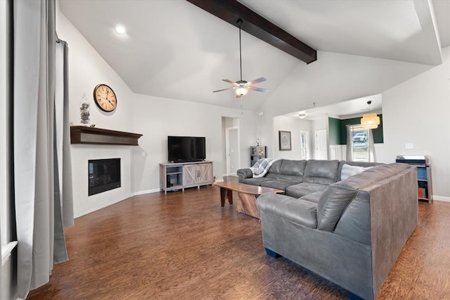 living room with lofted ceiling with beams, ceiling fan, and dark wood-type flooring