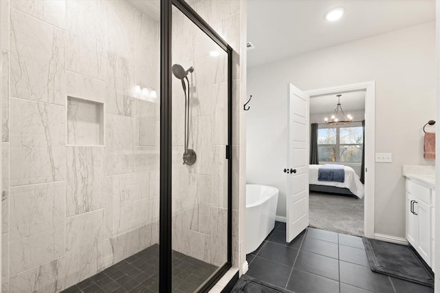 bathroom with tile patterned flooring, vanity, a chandelier, and plus walk in shower