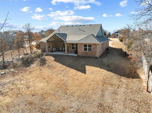 rear view of house featuring a patio area