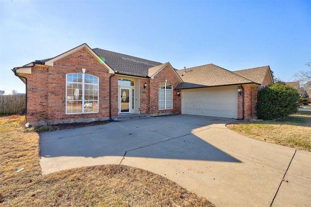 ranch-style house featuring a garage