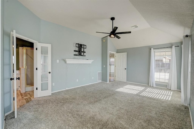 interior space with french doors, vaulted ceiling, and ceiling fan