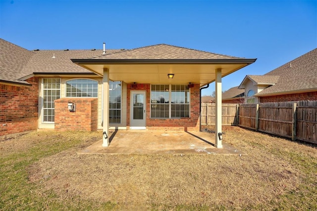 rear view of property featuring a patio