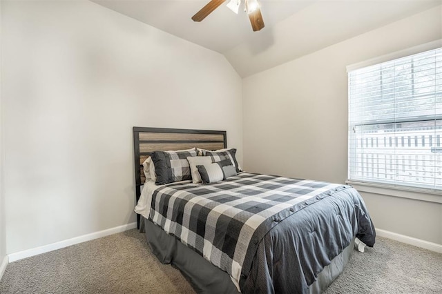 carpeted bedroom featuring ceiling fan and lofted ceiling