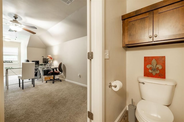 bathroom with ceiling fan, toilet, and vaulted ceiling