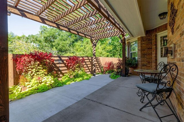 view of patio featuring a pergola