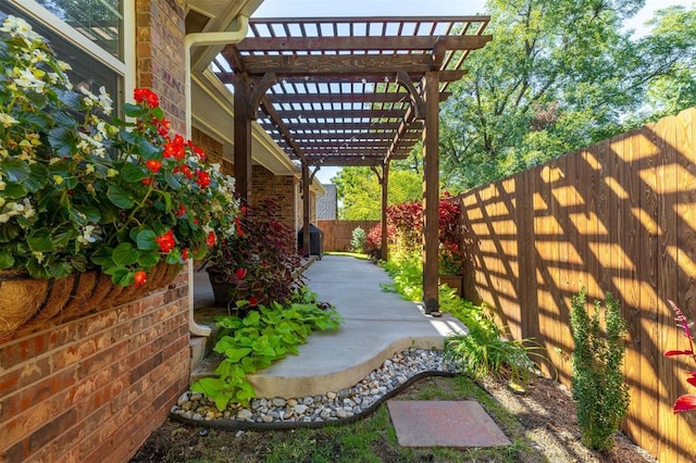 view of patio featuring a pergola