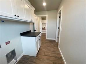 kitchen featuring white cabinets