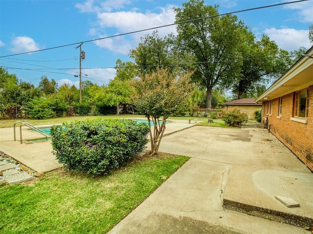 view of yard with a patio area