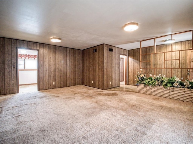 empty room featuring light colored carpet