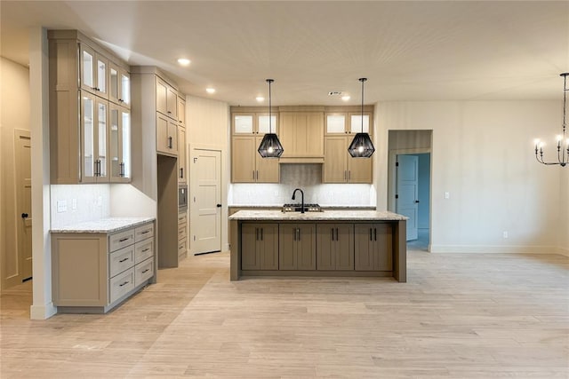 9224 NW 83rd St, Yukon, OK 73099 - kitchen featuring backsplash, baseboards, recessed lighting, and light wood-style floors