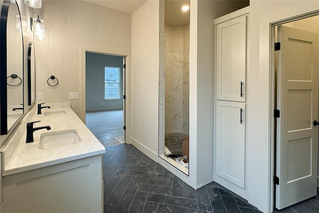 9224 NW 83rd St, Yukon, OK 73099 - full bath with double vanity, a shower stall, and baseboards