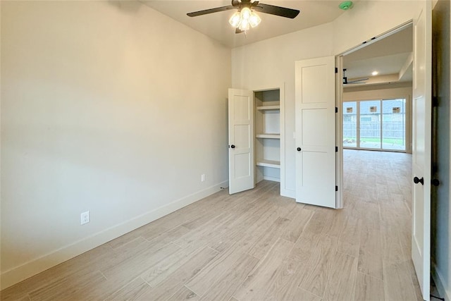 9224 NW 83rd St, Yukon, OK 73099 - unfurnished bedroom featuring light wood finished floors, baseboards, and ceiling fan
