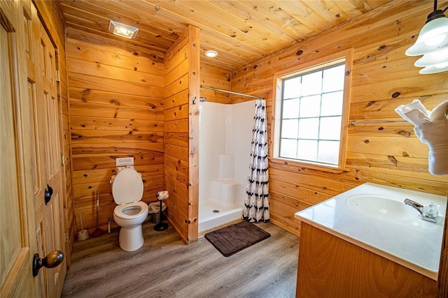 bathroom with wood walls, curtained shower, toilet, and wood ceiling