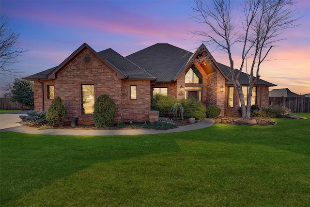 view of front of house with a lawn