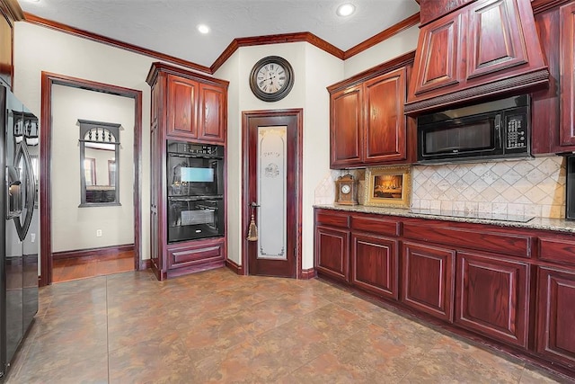 kitchen featuring crown molding, light stone countertops, backsplash, and black appliances