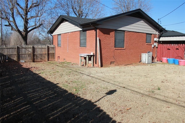 rear view of property with central air condition unit