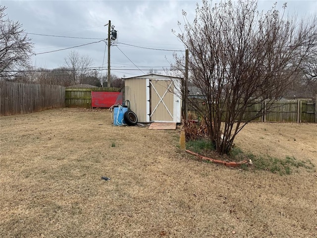 view of outbuilding with a yard