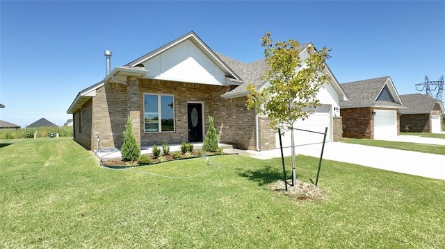 view of front of home featuring a garage and a front yard