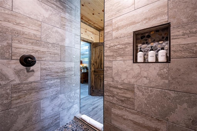 interior space featuring a tile shower