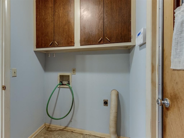 laundry area featuring hookup for an electric dryer, cabinets, and hookup for a washing machine